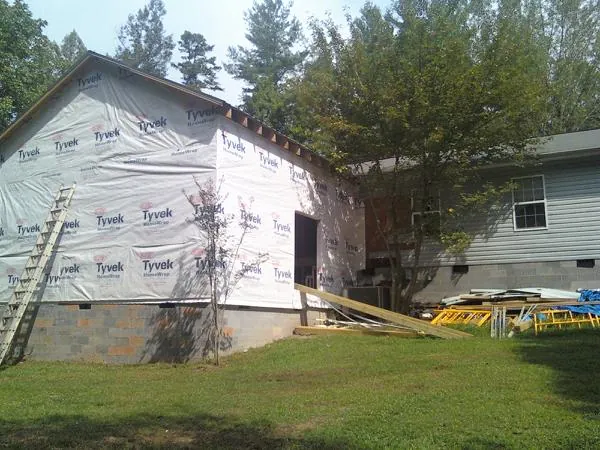 Tyvek wrapped gable on a new room addition beside an existing home in Hermosa Beach